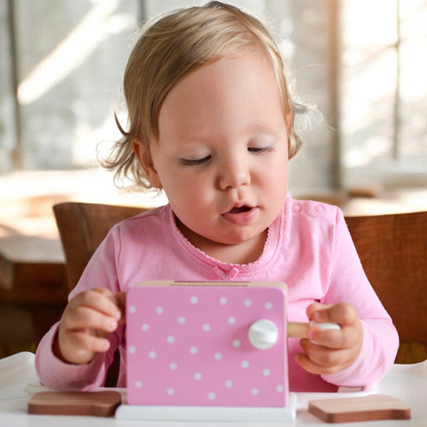 Toaster i træ med prikker, lyserød