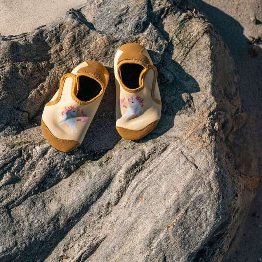 Badesko i Unicorn Shores